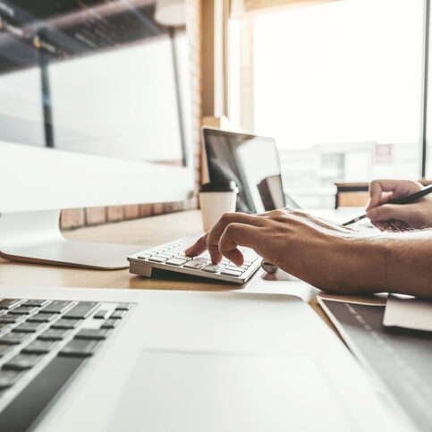 Developing programmer Development Website design and coding technologies working in software company office